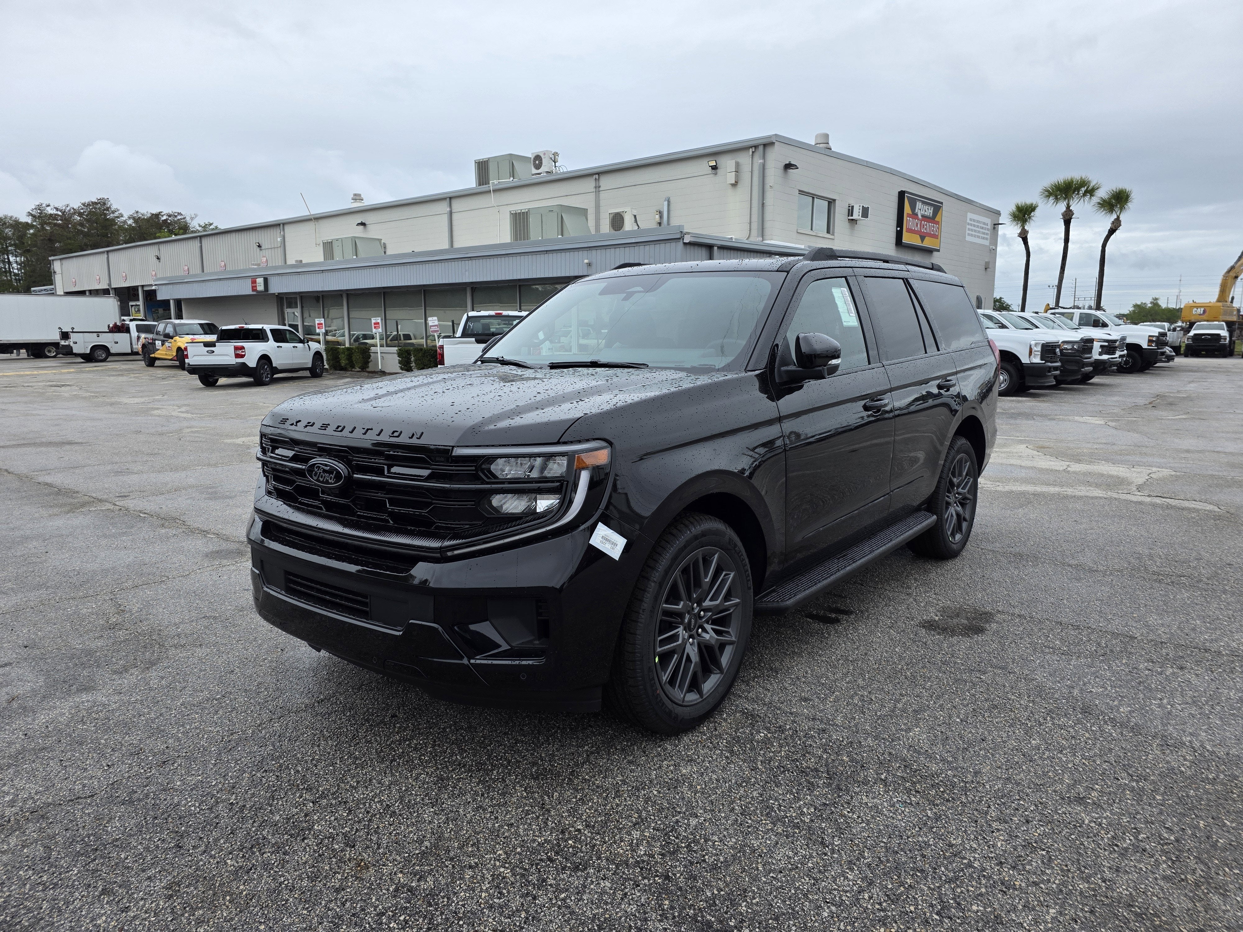 2026 Ford Expedition Platinum in Agate Black Metallic — front three-quarter view
