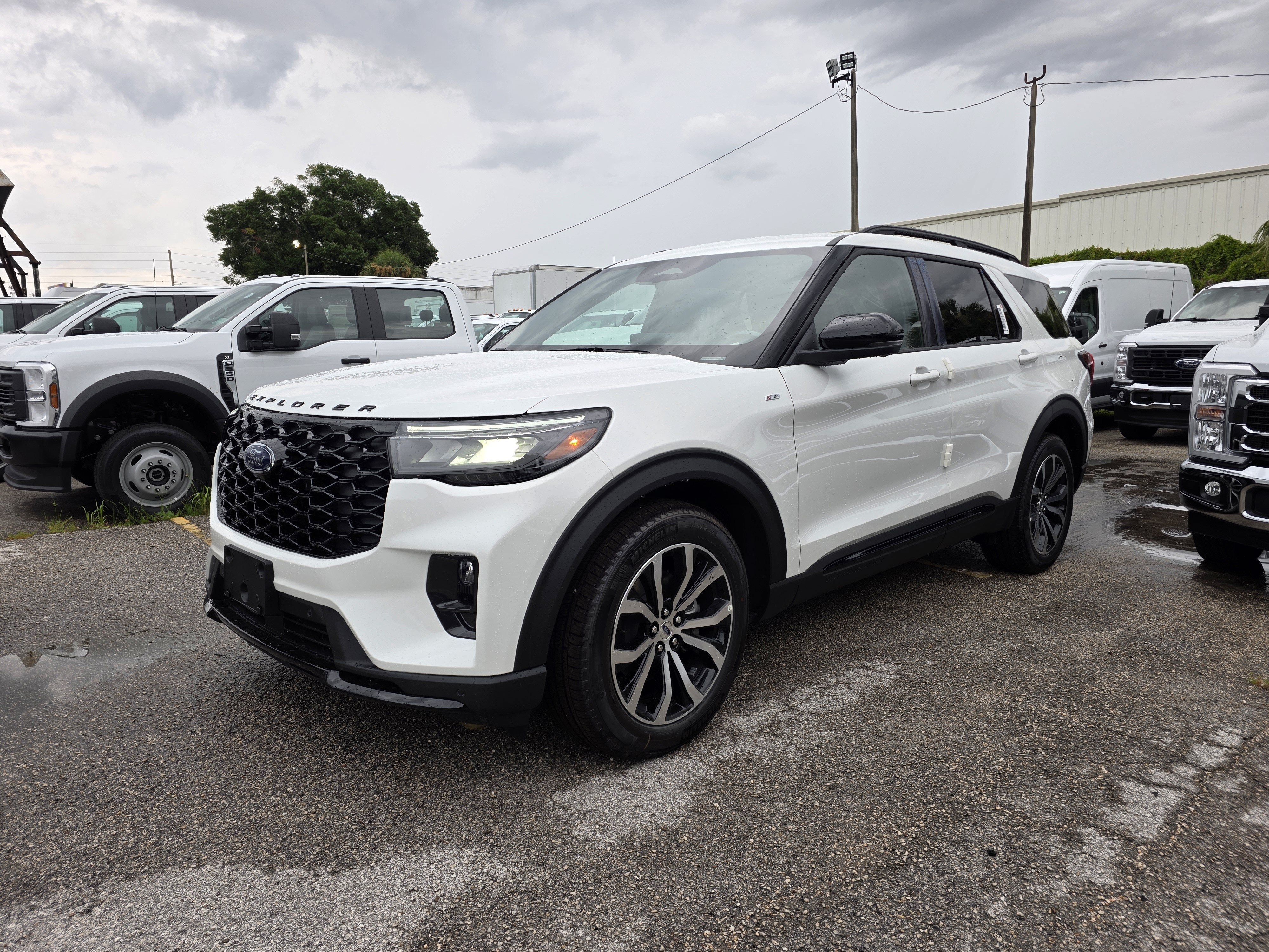2026 Ford Explorer ST in Star White Met Tri-Coat — front three-quarter view