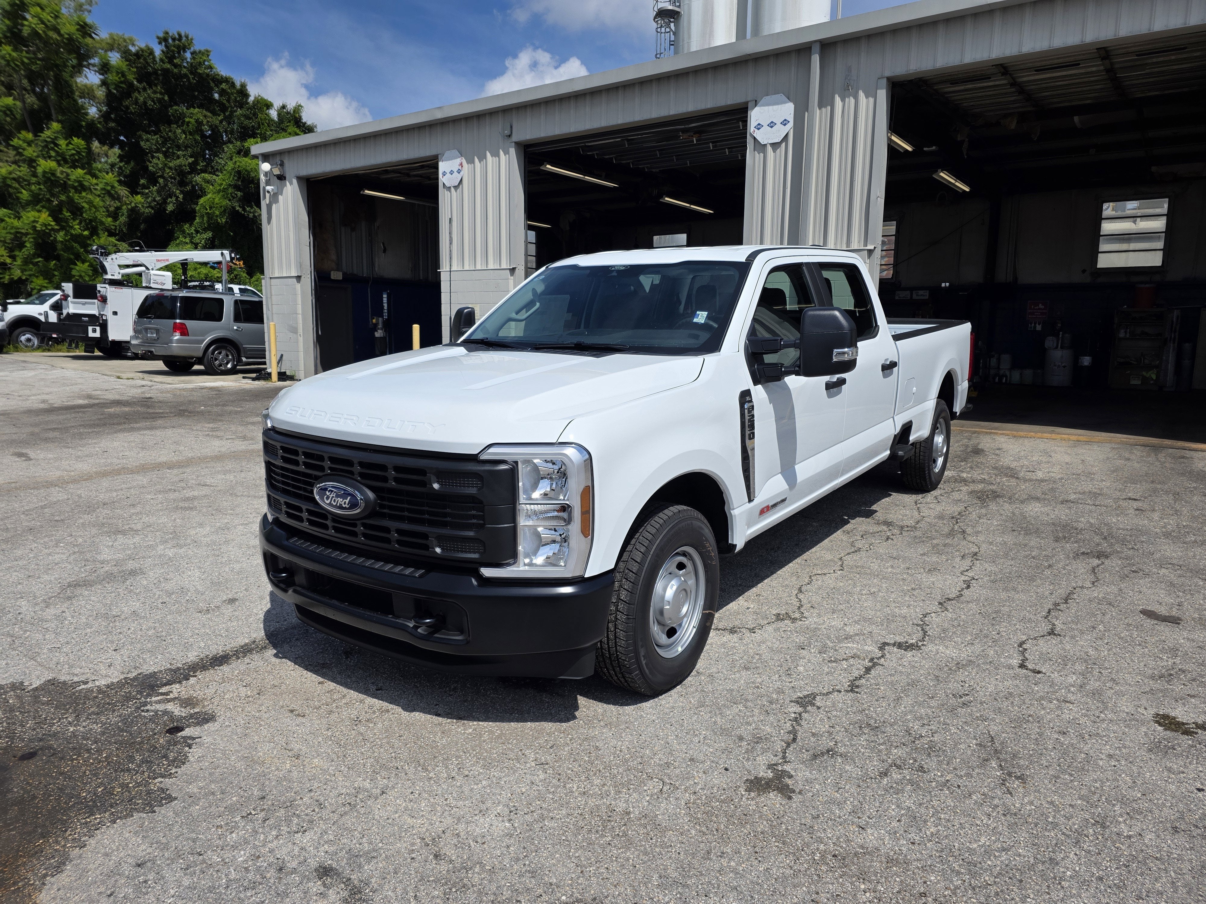 2026 Ford F-250 XL in Oxford White — front three-quarter view