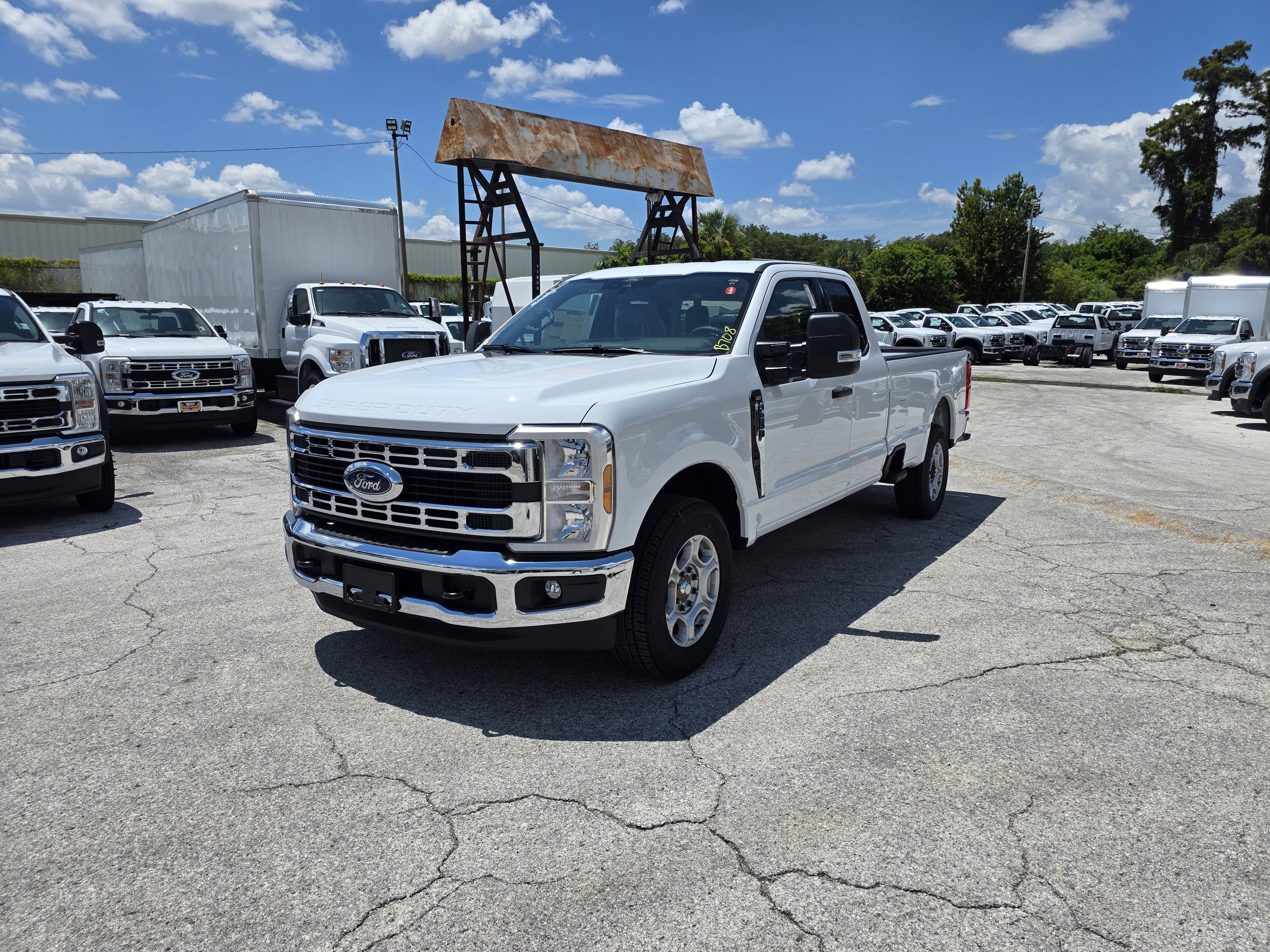 2026 Ford F-250 XLT in Oxford White — front three-quarter view