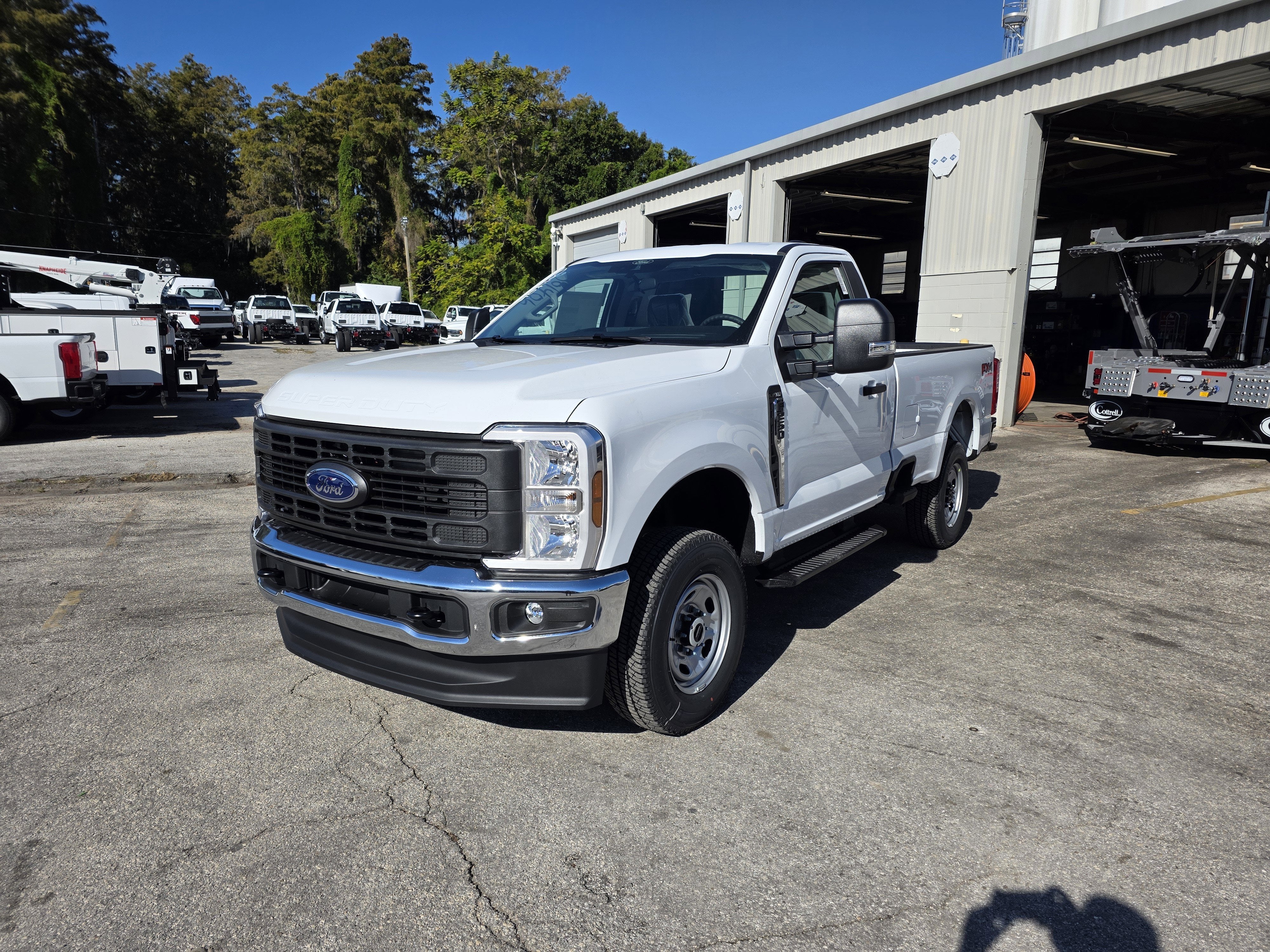 2026 Ford F-250 XL in Oxford White — front three-quarter view